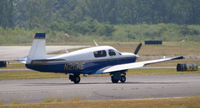 N2131E @ PDK - Taking off from Runway 20R - by Michael Martin