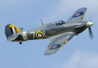 G-BKTH @ EGTH - As always the Sea Hurricane was flown sharply across Old Warden airfield during the anual summer air show. - by Joop de Groot