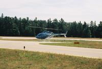 N335DM @ MGN - 1981 Bell 206B Parked @ Harbor Springs Airport (MGN) - by Mel II