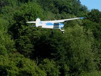 N2805C @ OH36 - Are those wheel fairings or fenders?  Departing the breakfast fly-in at Zanesville, OH (Riverside) - by Bob Simmermon
