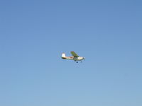 N2213G @ KSTP - Landing Runway 14. - by Mitch Sando