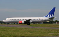 LN-RPL @ EGHH - SAS Boeing 737 - by Les Rickman