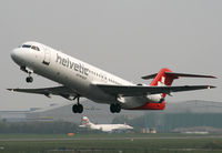 HB-JVC @ EGCC - Helvetic Fokker 100 in dreadful weather - by Kevin Murphy