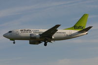 YL-BBP @ EBBR - arrival of flight BT601 to rwy 25L - by Daniel Vanderauwera