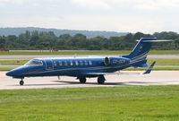 OY-OCV @ EGCC - Blue Lear Jet - by Kevin Murphy