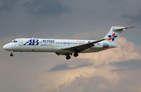 EC-HNZ @ LEBL - Espalmador on short final RWY 25R, with storm clouds behind. - by Jorge Molina