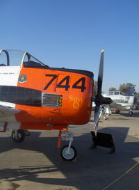 N28XC @ CMA - 1954 North American T-28C TROJAN 'Susy Q', Wright R-1820 Cyclone 1,425 Hp, logo - by Doug Robertson