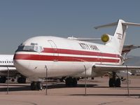 N264US @ TUS - Stored at Hamilton's facility at Tucson - by John Meneely