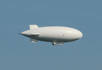 N602SK - Unadorned with advertising, this airship serenely floated over the Hudson River along the Manhattan skyline. - by Daniel L. Berek