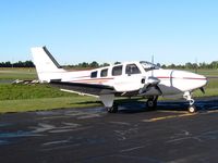 N212MG @ DLZ - On the ramp at Delaware, OH - by Bob Simmermon