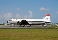 N406WA @ OPF - Military version of the DC-4 today carrying cargo - by Ivan Cholakov