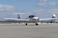 C-FECP @ YXU - Taxiing onto Ramp 3. - by topgun3