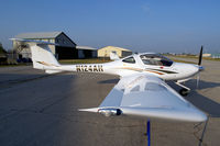 N124AH @ YXU - Parked in front of Diamond Flight Centre - by topgun3