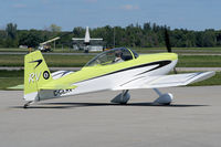 C-GERV @ YXU - Taxiing across Ramp III for departure. - by topgun3