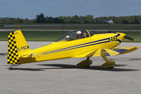 C-FACM @ YXU - Taxiing across Ramp III for departure. - by topgun3