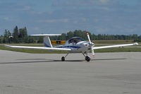 C-GEWM @ YXU - Taxiing across Ramp III. - by topgun3