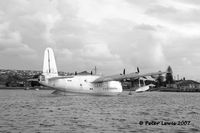 NZ4108 - arriving at Rose Bay, Australia, on delivery flight as VH-BRF, still with military fit - by Peter Lewis