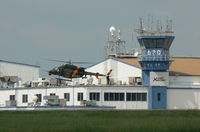 N44515 @ GKY - Bell ARH Program - Ship 1 flying past the XworX Tower and Hnger Building - by Zane Adams