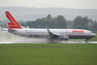 OE-LNS @ LOWG - maximum reverse on wet runway!