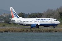 EI-CXN @ LGKR - Transaero 737-300 - by Andy Graf-VAP