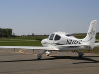 N276KC @ KLVN - Starting up on the ramp at Airlake. - by Mitch Sando
