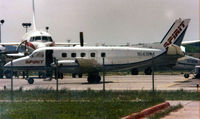 N141EM @ DFW - In BraniffII - Spirit commuter colors - by Zane Adams