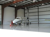 N409SF @ KLVN - Parked inside the new Aircraft Resource Center Hangar. - by Mitch Sando
