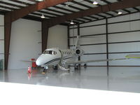 N409SF @ KLVN - Parked inside the new Aircraft Resource Center Hangar. - by Mitch Sando