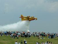 N215NC @ KHKY - Droping a load of water for a crowd at the Warbirds Over Hickory Airshow in 2003.
