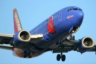 N647SW @ LAX - Southwest Airlines N647SW Triple Crown One (FLT SWA1584) from Phoenix Sky Harbor Int'l (KPHX) on final approach to RWY 24R. - by Dean Heald