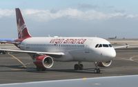 N628VA @ SFO - taken from my seat aboard an Air France 747 - by olivier Cortot