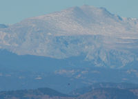 N28KT @ KAPA - Power Play PLAYS over Downtown Littleton 13 miles West of KAPA. (Mount Evans in the background) - by Bluedharma