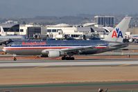 N322AA @ LAX - American Airlines N322AA (FLT AAL117) from John F Kennedy Int'l (KJFK) exitting RWY 25L after landing. - by Dean Heald