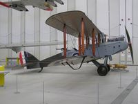 D5649 @ EGSU - Restored DH9 in the hangar at Duxford