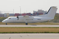N966HA @ CYYZ - Taxing on 15R - by Nigel Hay