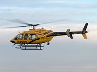 N4999 @ LUK - Departing after a fuel-stop - by John Meneely