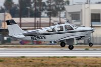 N252V @ VNY - 1971 Beech F33A Bonanza N252V departing RWY 16R. - by Dean Heald