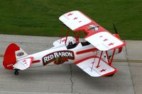 N801RB @ CID - Reb Baron PT-17 42-16525 passing by the tower - by Glenn E. Chatfield