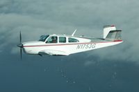 N354FB - Over Puget Sound - by Eileen A Hemman