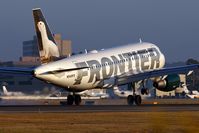 N949FR @ SNA - Frontier Airlines N949FR White Ermine (FLT FFT371) from Denver Int'l (KDEN) landing on RWY 19R. - by Dean Heald