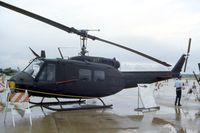 64-13517 @ NBU - UH-1H at the open house - by Glenn E. Chatfield
