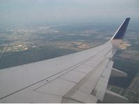 N27239 @ IAH - Wing of #239 as we were descending into the Houston area - by Frank White