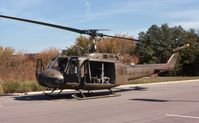 69-15882 - UH-1H in motel parking lot for Helicopter Association International meeting.  Crystal Lake, IL - by Glenn E. Chatfield