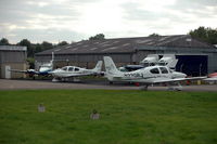 N220RJ @ EGBJ - N220RJ at Staverton airport with N982CD - by Henk van Capelle