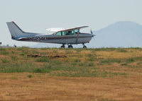 N5234K @ KAPA - Taxi for Takeoff with Pike's Peak in the background - by Bluedharma