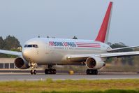 N791AX @ LGB - ABX Air N791AX (still in Airborne Express colors) starting takeoff roll on RWY 30 as FLT ABX407 bound for Airborne Airpark (KILN). - by Dean Heald