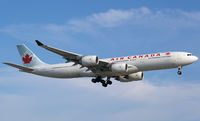 C-GKOM @ CYYZ - AC088 arriving from Shanghai on Rwy23 - by Nigel Hay