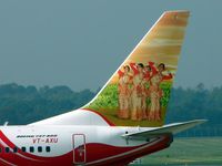 VT-AXU @ EGBB - One of the two stunning tail liveries on this aircraft - by Terry Fletcher
