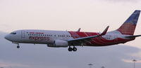 VT-AXN @ EGBB - On its delivery flight to warmer climes VT-AXN lands on a cold January morning at Birmingham UK - by Steve Hambleton