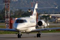 N874QS @ VNY - NetJets 2000 Raytheon Hawker 800XP N874QS (FLT EJA874) taxiing to RWY 16R for departure to Bellingham Int'l (KBLI), Washington.